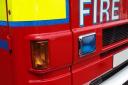 Five fire crews have been sent to rescue a trapped red deer in Leavenheath