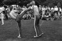 Kick boxing tournaments got underway, as the crowds looked on at the action in 1979