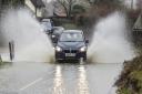 A backlog of flooding problems on Suffolk's roads will take between 7 and 10 years to address, Suffolk Highways has said
