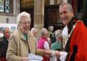 Mrs Queenie Ablitt receiving her Ascension Day gift voucher from mayor Jack Owen.