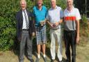 Suffolk senior champion Andy Ball (second from left) with runner-up Roger Taylor and third place John Whitby who were both one shot off the pace. Suffolk Golf Union president Colin Firmin is on the left. Photograph: TONY GARNETT