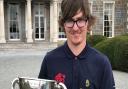 Paul Waring of Felixstowe Ferry with his trophy after winning the World Deaf Championship at Carton House Golf Club in Ireland. Photograph: CONTRIBUTED