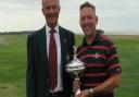 Mel Pipe receives the Coronation Cup from Felixstowe Ferry captain Steve Frost. Picture: TONY GARNETT