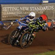 Jack Thomas crashes out behind Troy Batchelor and Kings Lynn's Josh Pickering in heat four.