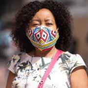 Kele in her brightly coloured face mask ready to shop in Ipswich  - health chiefs still expect people to wear them in enclosed spaces even after restrictions are lifted
