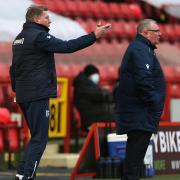 Gillingham manager Steve Evans (right) and his assistant Paul Raynor (left) on the touchline.