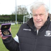 Richard Powell with his FA 50-Year Service Medal. Picture: SUFFOLK FA