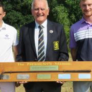 SUFFOLK MATCHPLAY: Runner-up Louis Martin (left), SGU president Colin Firmin and winner James Biggs at Rookery Park with the Presidents Mashie Trophy. Photograph: TONY GARNETT