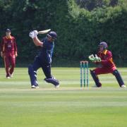 Suffolk skipper Adam Mansfield in action, keeping wicket. Picture: NICK GARNHAM