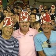 Don Topley, centre, was impressed by the Big Bash League in Australia - here he is as a 'buckethead' while watching the Melbourne Renegades. Picture: DON TOPLEY