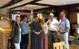 South Suffolk MP James Cartlidge visited the Cock Inn in Clare to discuss their management's concerns over soaring energy prices.