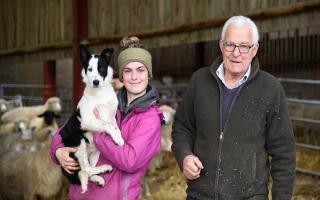 Stephen Cobbald owner of Acton Hall farm near Sudbury with young farm apprentice Amy Byford